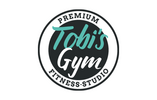 Logo Tobi’s Gym – Premium Fitnessstudio Rundes Logo von Tobi’s Gym mit schwarzem Hintergrund und türkis-weißem Schriftzug, ergänzt durch die Worte Premium Fitness Studio
